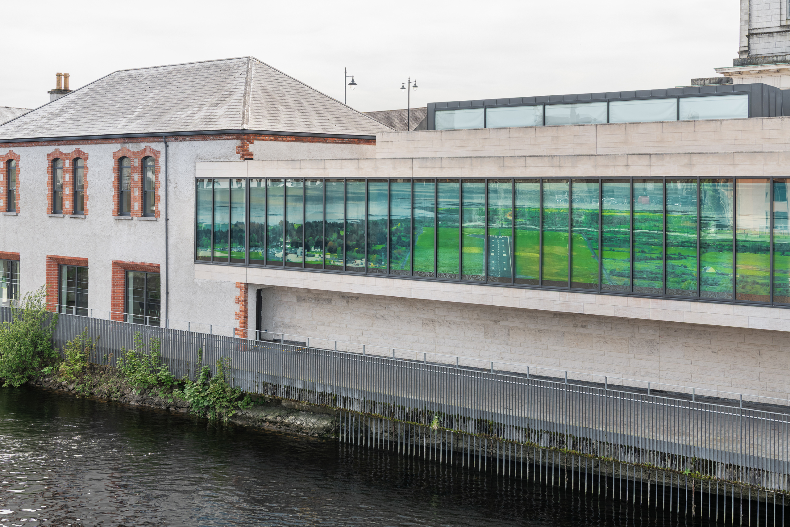 Outside landscape art on the windows at Luan Gallery at the exhibition Vassadoms United
