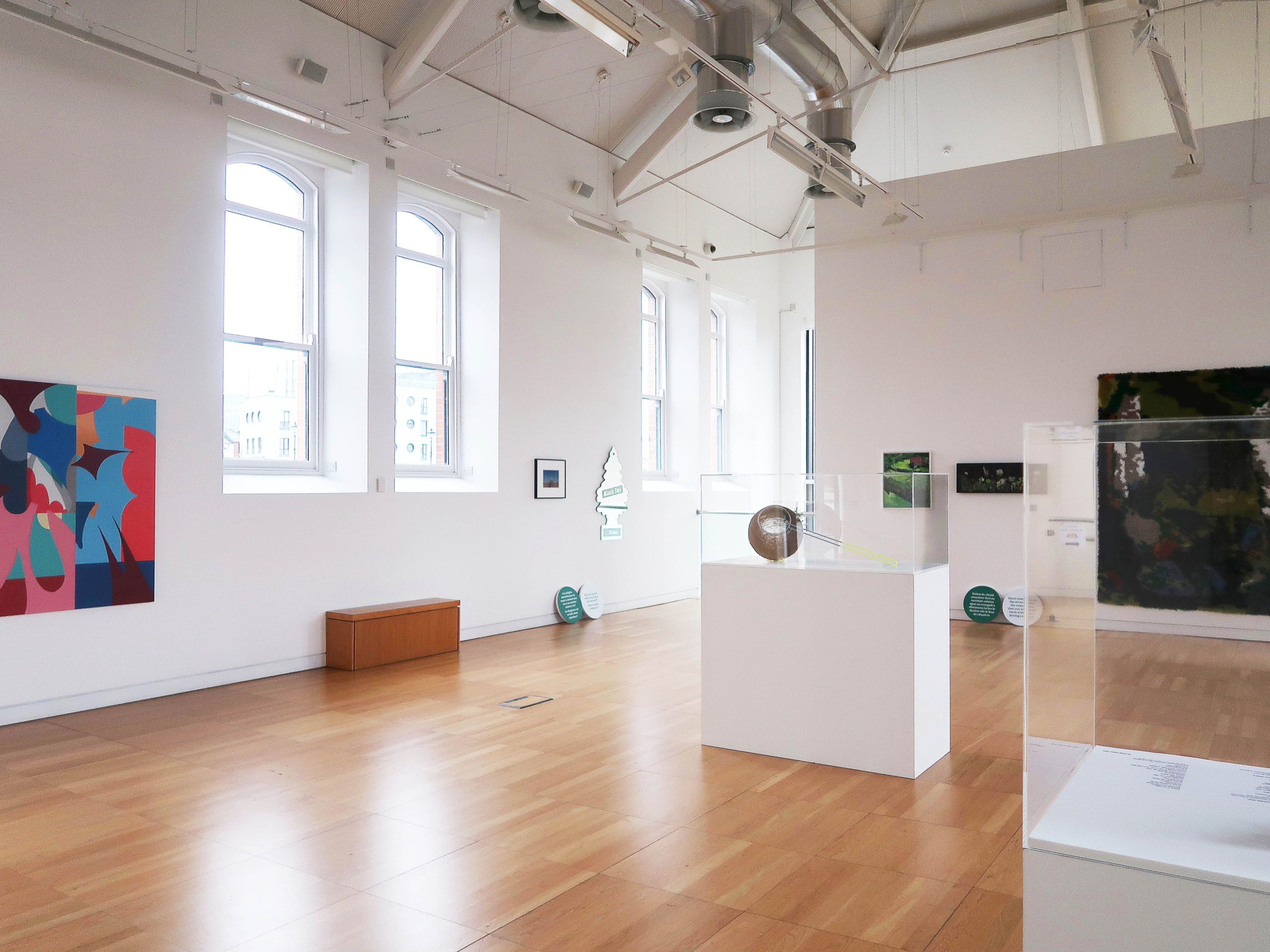 Art on wall and installations on the floor from the exhibition Connections at Luan Gallery