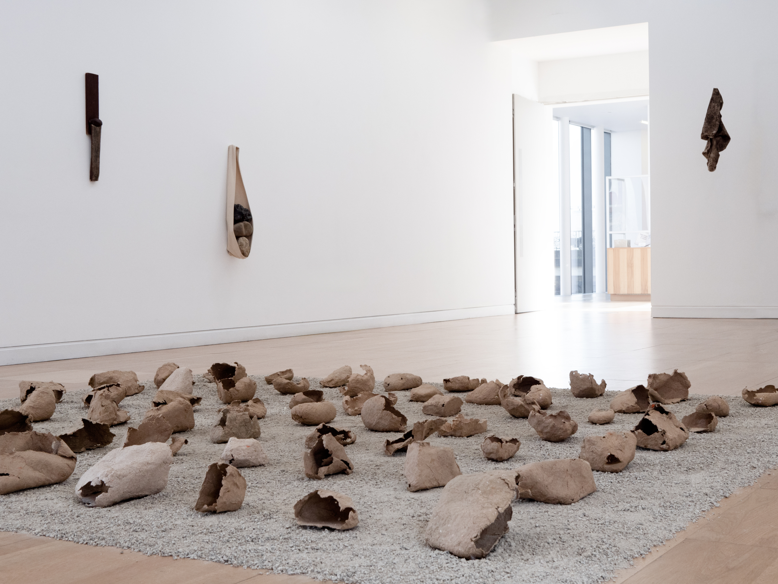 Installation on gravel on the floor at the exhibition Take care to leave a trace at Luan Gallery