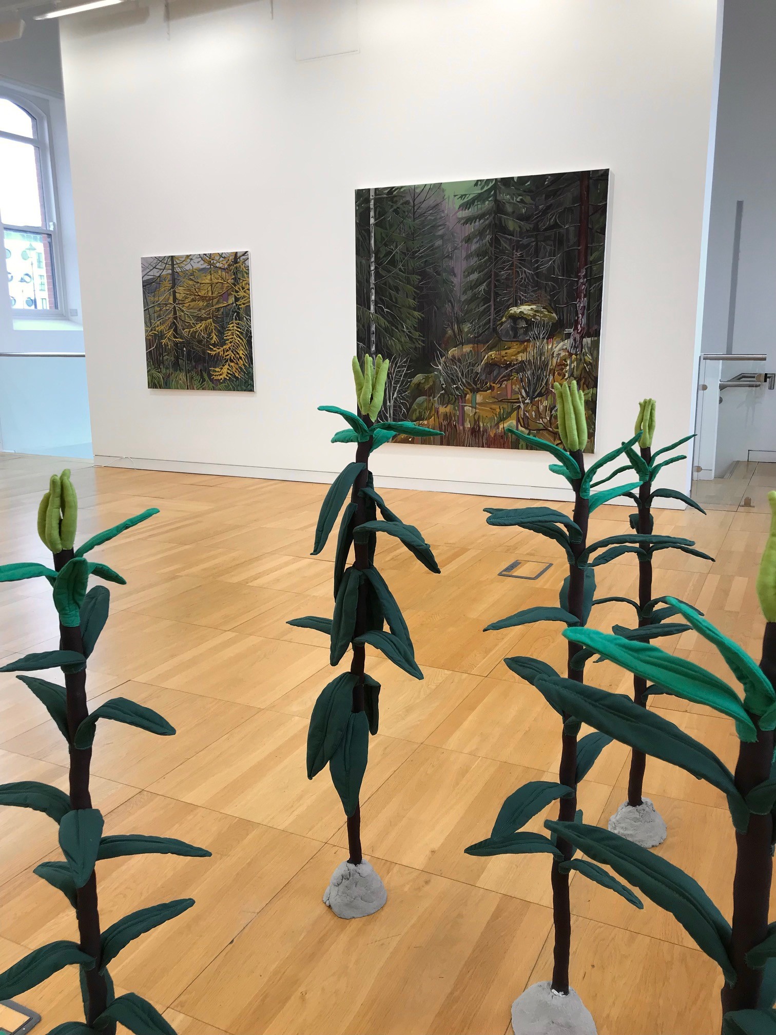 Cecilia Danell exhibition "Tactile Terrain" at Luan Gallery - plant sculptures on the wooden floor